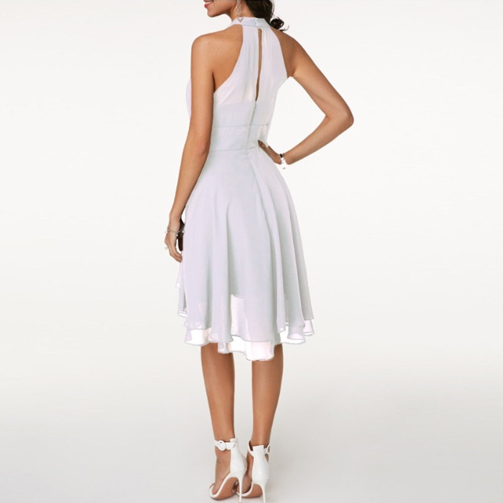 Hilda - Women's Flowing Mini Dress with a Halter Neck